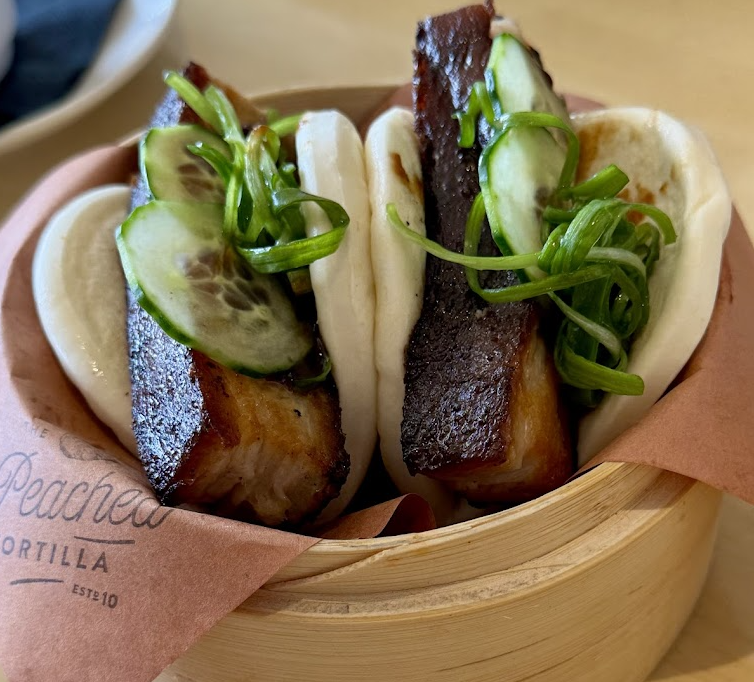 The Peached Tortilla signature dishes Chinese BBQ Chicken
Asian Chicken Salad Wrap w/ Belgian Fries
Korean Steak Bowl